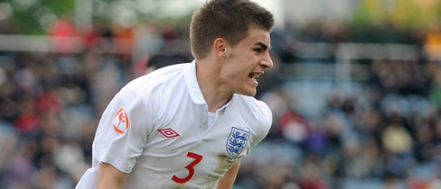 Luke Garbutt wheels away in delight after equalising for England.